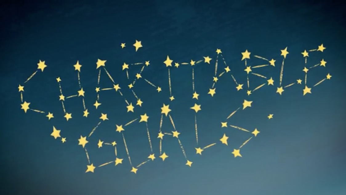 The words "charitable goals" spelled out in stars