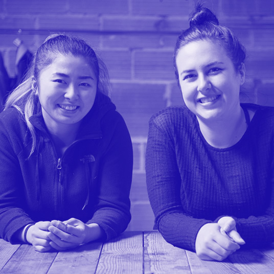 Two smiling people