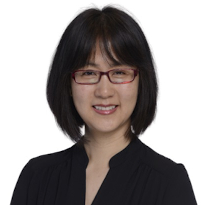 Headshot of Dawn Jia, a smiling woman with dark hair and glasses