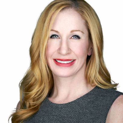 Kelly Woodall Headshot of Kelly Woodall, a smiling woman with long blonde hair and light eyes wearing red lipstick and a grey herringbone blouse