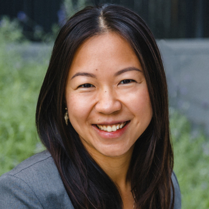 Headshot of Mandy Pui, a smiling woman with long dark hair