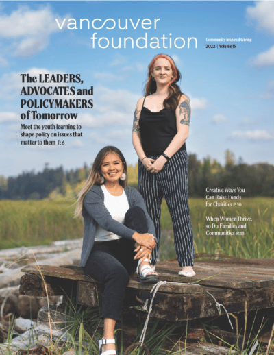 Cover photo of the 2022 Vancouver Foundation Magazine featuring two LEVEL Youth Policy Program participants.