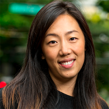 Headshot of Jenny Lee-Leugner. She is wearing a black top and has long black hair.