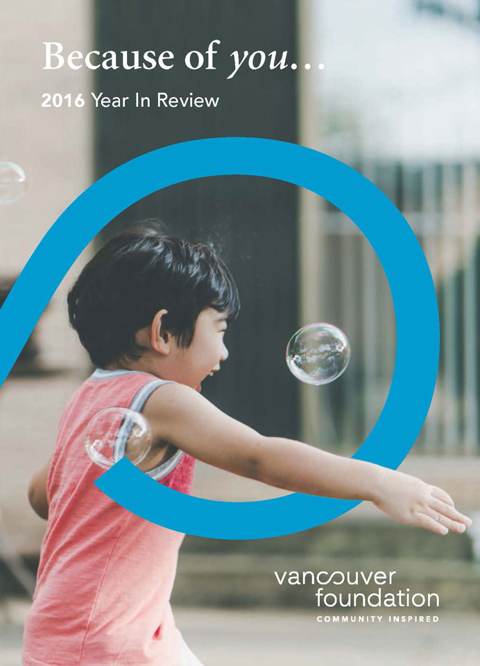 2016-YIR-Cover-Page-for-Blog Magazine cover of a dark haired little boy laughing and playing with bubbles, a blue semicircle encircling his head and torso with text reading "Because of you, 2016 in Review. Vancouver Foundation"