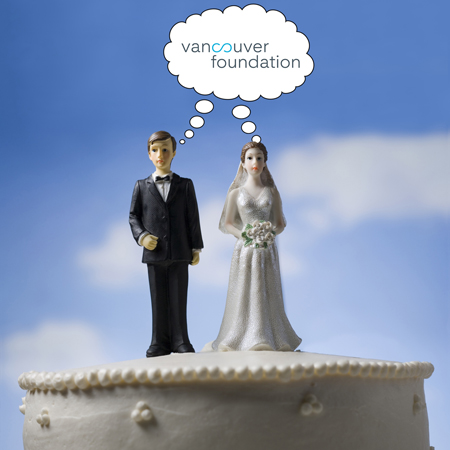 Wedding cake with bride and groom cake topper with a thought bubble reading "Vancouver Foundation"