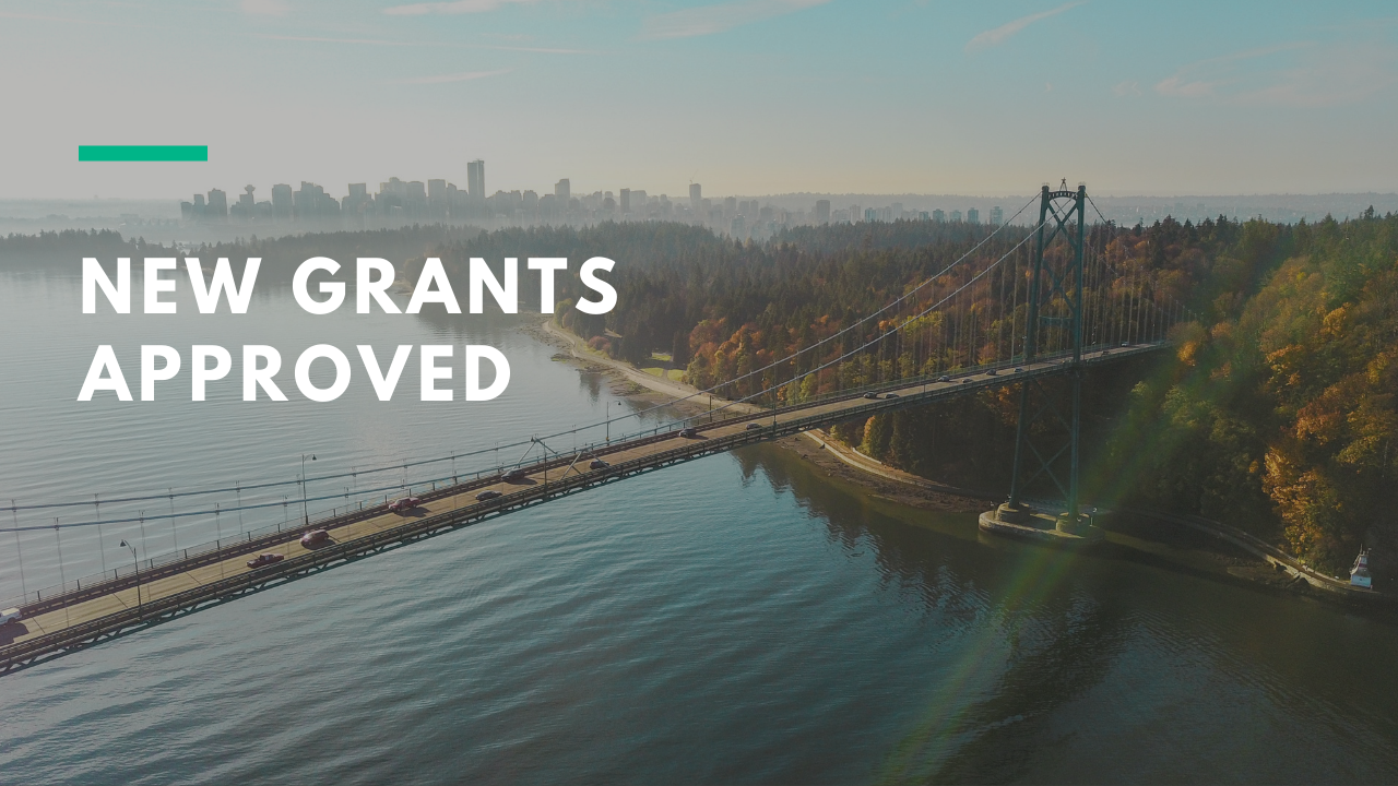 Text reading "New Grants approved" over an autumn photo of the Lion's Gate Bridge